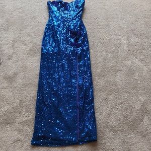 Blue sequin strapless prom dress.